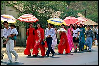 Traditional wedding procession on a countryside road. Ben Tre, Vietnam (color)