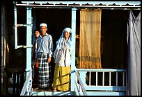 Muslem family outside stilt house in Cham minority village. Chau Doc, Vietnam ( color)