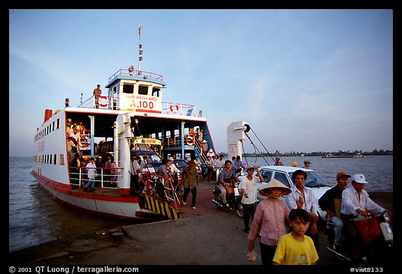 Disembarking from a ferry on one of the many arms of the Mekong. My Tho, Vietnam (color)