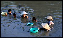 Collecting clams, near Long Xuyen. Mekong Delta, Vietnam (color)
