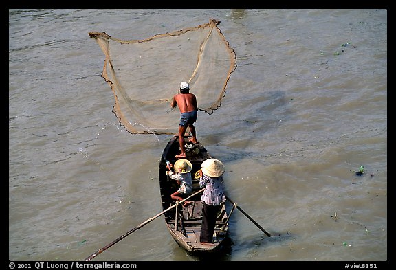 Fisherman casting net seen from above. Can Tho, Vietnam