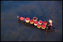Transporting fruit on a small boat. Can Tho, Vietnam