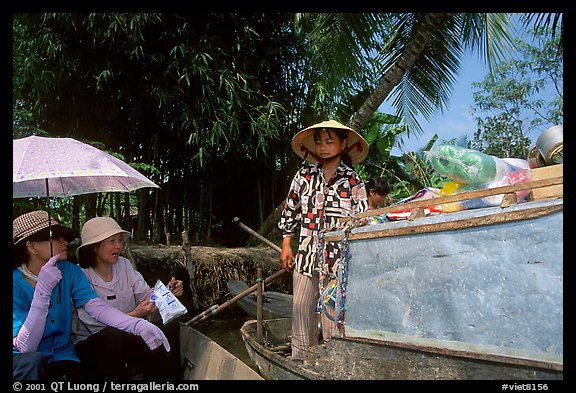 Buying groceries on the Phong Dien floating market. Can Tho, Vietnam