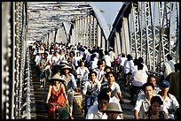 Rush hour on the Trang Tien bridge. The numbers of cars is insignificant compared to Ho Chi Minh city. Hue, Vietnam