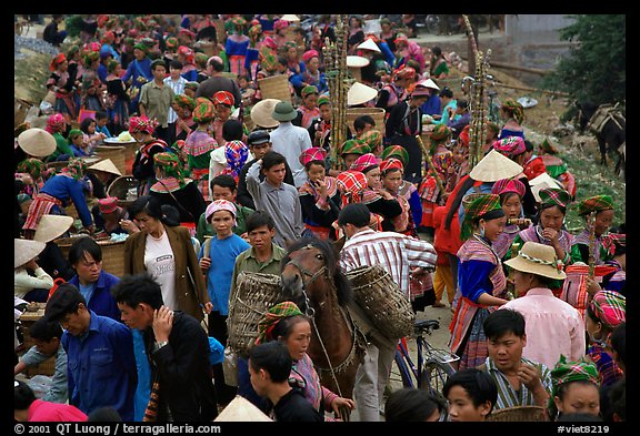 Colorful crowd at the sunday market, where people from the surrounding hamlets gather weekly to meet, shop and eat. Bac Ha, Vietnam