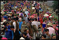 Colorful crowd at the sunday market, where people from the surrounding hamlets gather weekly to meet, shop and eat. Bac Ha, Vietnam (color)