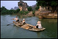 Villagers transport stones from the quary on Ken Ga canal. Ninh Binh,  Vietnam ( color)