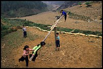 Children playing a rotating swing near Can Cau. Vietnam